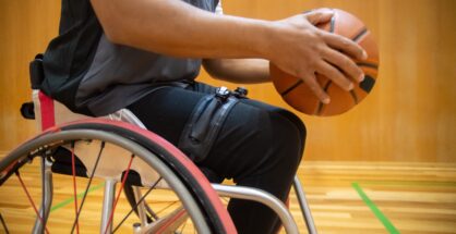Men playing wheelchair basketball
